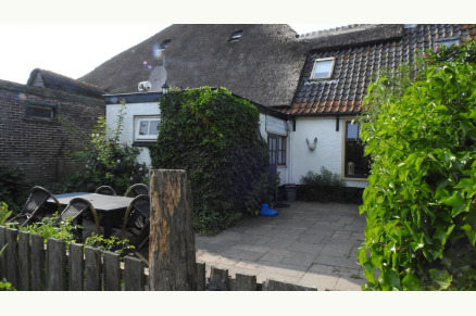 Kleurrijk knus vakantiehuis met bedstede bij Den Burg Texel VMP105